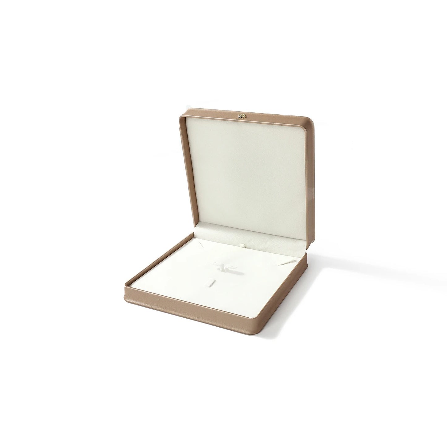 Open jewelry box with a white interior on a white background